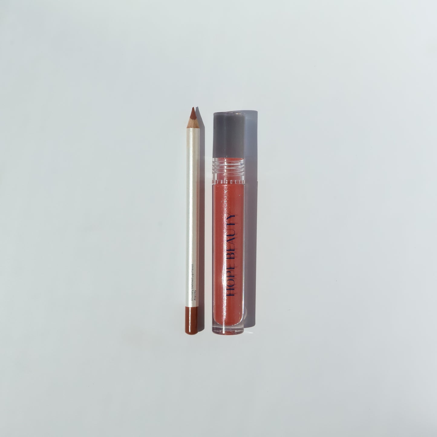 Abigail Lip Kit by Hope Beauty is inspired by Abigail from the Bible, who was known for her wisdom and beauty. Biblically inspired cosmetics. Inspirational makeup. Faith inspired makeup. Faith based company. Women of the Bible. Lip oil and lip gloss hybrid.