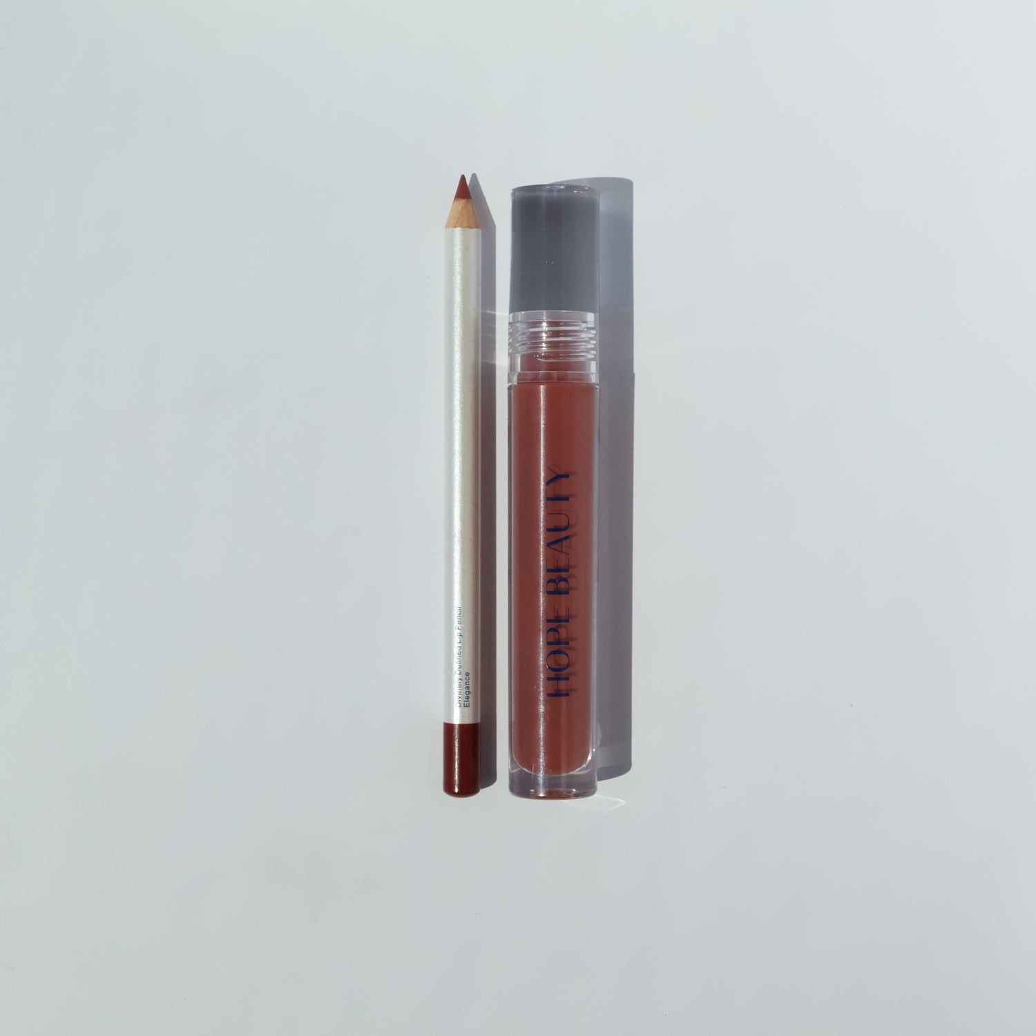 Esther Lip Kit is a lip gloss and lip liner set. Biblically inspired cosmetics. Faith inspired cosmetics. Inspirational makeup. Christian makeup. Women of the Bible. Lip oil and lip gloss hybrid. 
